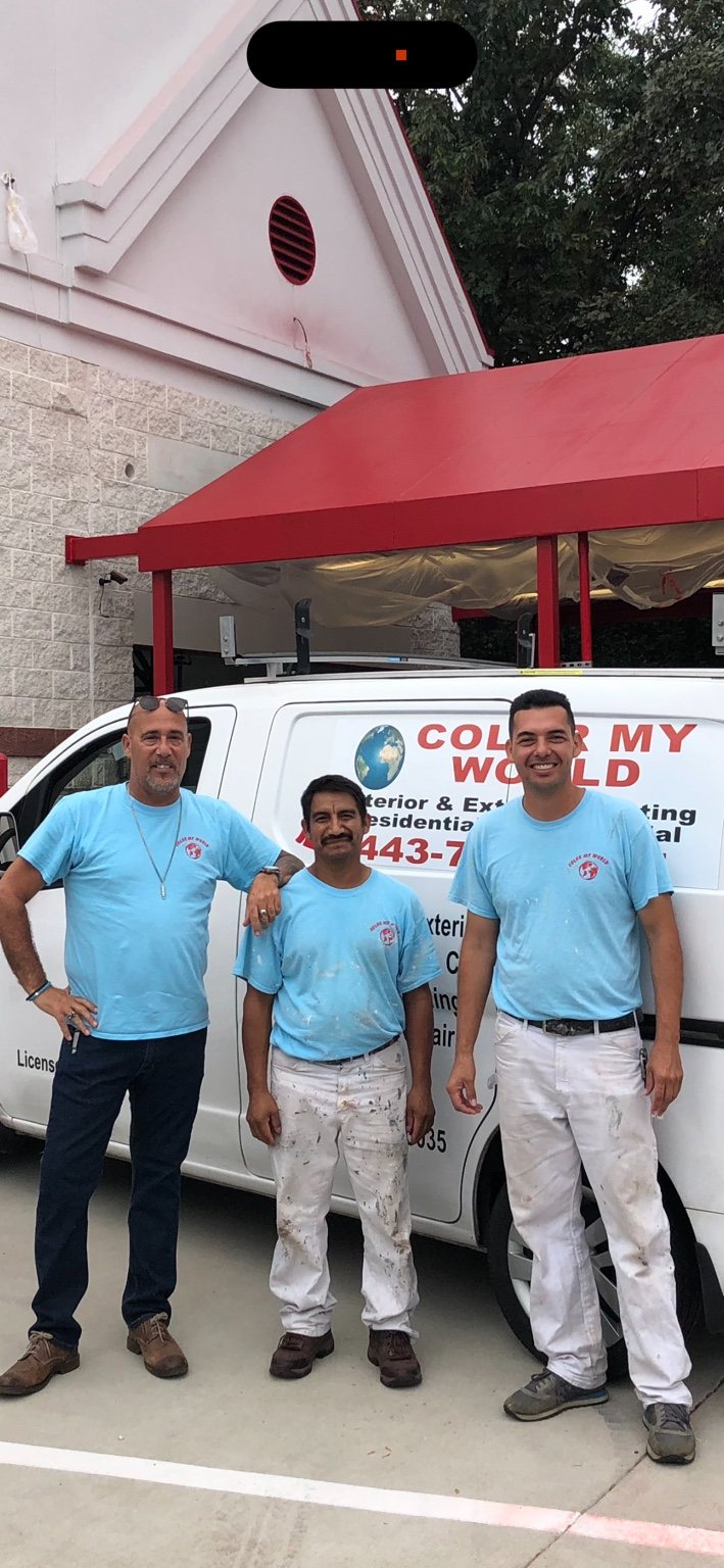 The Color My World Painting crew with the company work van in Maryland